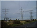 NZ2781 : Power lines at Bebside by Tim Fish