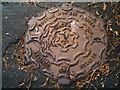 Main sewage manhole cover near church, Woolsthorpe