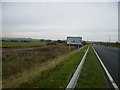TA0282 : The A64 running parallel with the railway line near Seamer by Phil Catterall