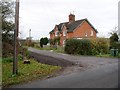 SU1181 : Houses off minor road south of West Swindon by Chris Henley