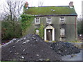 Derelict house on a roundabout