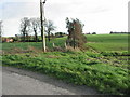 View of farmland and footpath sign.