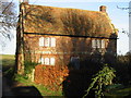 House near junction with Green Lane path.