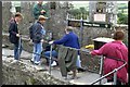 W6075 : Kissing the Blarney Stone by Raymond Okonski
