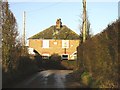 House on Knell Lane at junction with road from Goldstone.