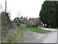 Cottage by a bend in the lane.