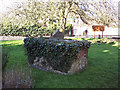 Ivy covered tomb in St Marys Churchyard, Shrewton