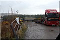 Vehicle yard by the River Deveron