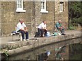 Three fishermen, Old Ford Lock, East London