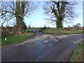 TM1599 : Farm Lane Junction on Bend, Wreningham by Ian Robertson