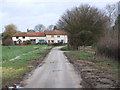 TM1491 : Farm Houses, Low Common by Ian Robertson