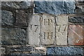 Stones dated 1777 in bus shelter in Pontllyfni