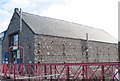 A ship chandlery in a converted sail drying shed at Menai Marine