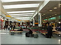 TQ0776 : Heathrow Terminal 1, seating and shopping area by David Hawgood