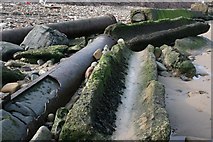 NZ6721 : Broken Victorian Sewage Pipe by Mick Garratt