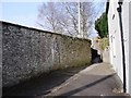 Arched doorway in the wall near the churchyard, Shepton Mallet