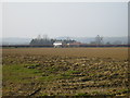 View over farmland to Tuft House Farm