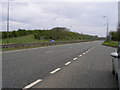 NZ4335 : The A19 dual carriageway cuts through a hill by Carol Rose