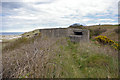 NU1635 : WWII gun emplacement overlooking Budle Bay by Phil Champion