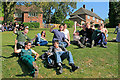 Students relaxing in the afternoon sun at Saxony Crescent, Sparsholt College