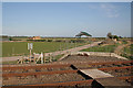 Railway footpath crossing and poultry farm near Kirkby Green