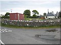 Bungalow and container at Ardigon crossroads