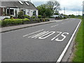 A75 and roadside housing at Springholm