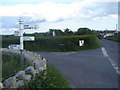 Road sign and crossroads, near Broadway