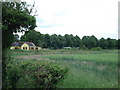 Yellow cottage near Upper Honeydon Farm