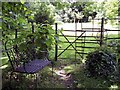 Gate and chair in All Saints Churchyard