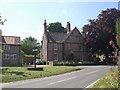 Village green and sign, Great Snoring