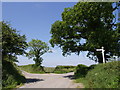 SX3986 : Lane junction near Stone Farm by Derek Harper