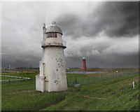 TA1818 : South Killingholme lighthouses in rain by Steve  Fareham