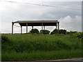 An open barn stands on the site of Strawberry Hall