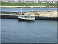 Fishing boat BCK77 entering the outer harbour, Wick