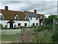 Cottage And Footpath Sign