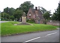 SJ3514 : The English Lodge and war memorial, Alberbury by E Gammie