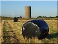 Bales and water tower near Stonehenge