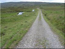 NN6967 : Allt Con and Loch Con track by Chris Wimbush