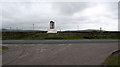 NF8043 : Road junction and shrine, South Uist. by Gordon Hatton