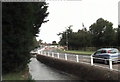 Brook flowing alongside Station Road.