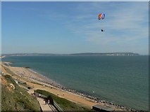 SZ2492 : Barton on Sea: beach, paraglider, view by Chris Downer