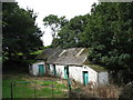 Old farm buildings alongside the  A5 at Pentre Berw