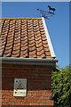 Weathervane on farmhouse