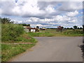 Farm machinery at the road junction