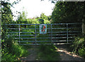 Gated entrance to private woodland.