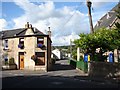 At the entrance to Holm Road by the church