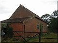 Farm buildings opposite footpath entrance, Crabgate