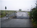 Cattle grid & road towards Pen-y-garreg Farm