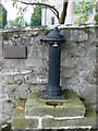 Millennium Drinking fountain outside Llanferres Church